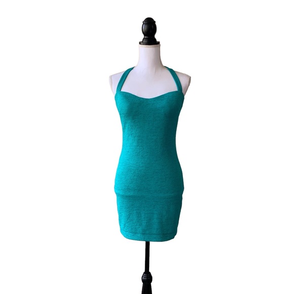OFF  BEBE TEAL BODYCON RIBBED CUTOUT MINI DRESS - Picture 10 of 15